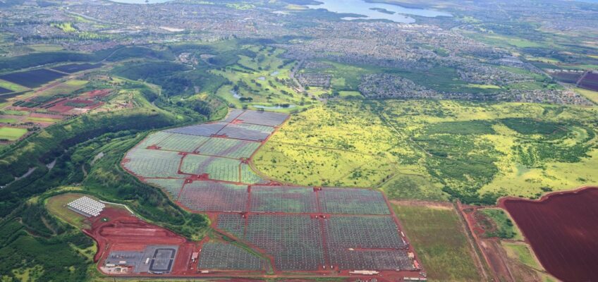 Aerial view of farmland and distant coastline