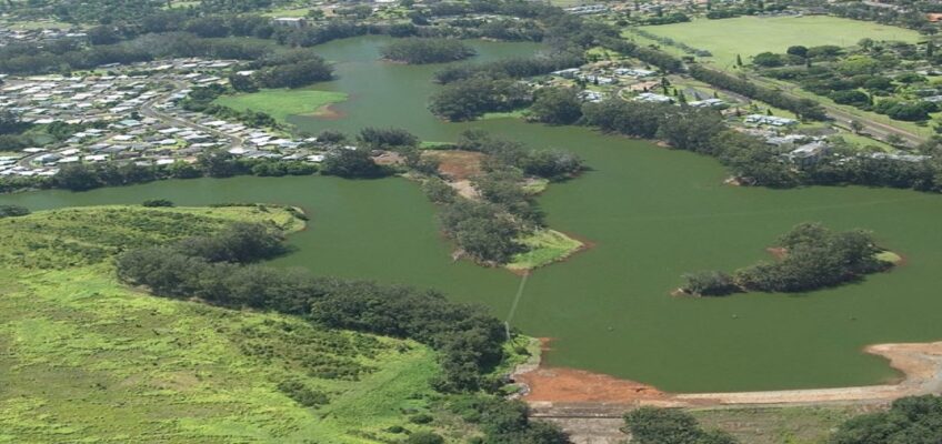 Aerial view of green lakes and surrounding landscape